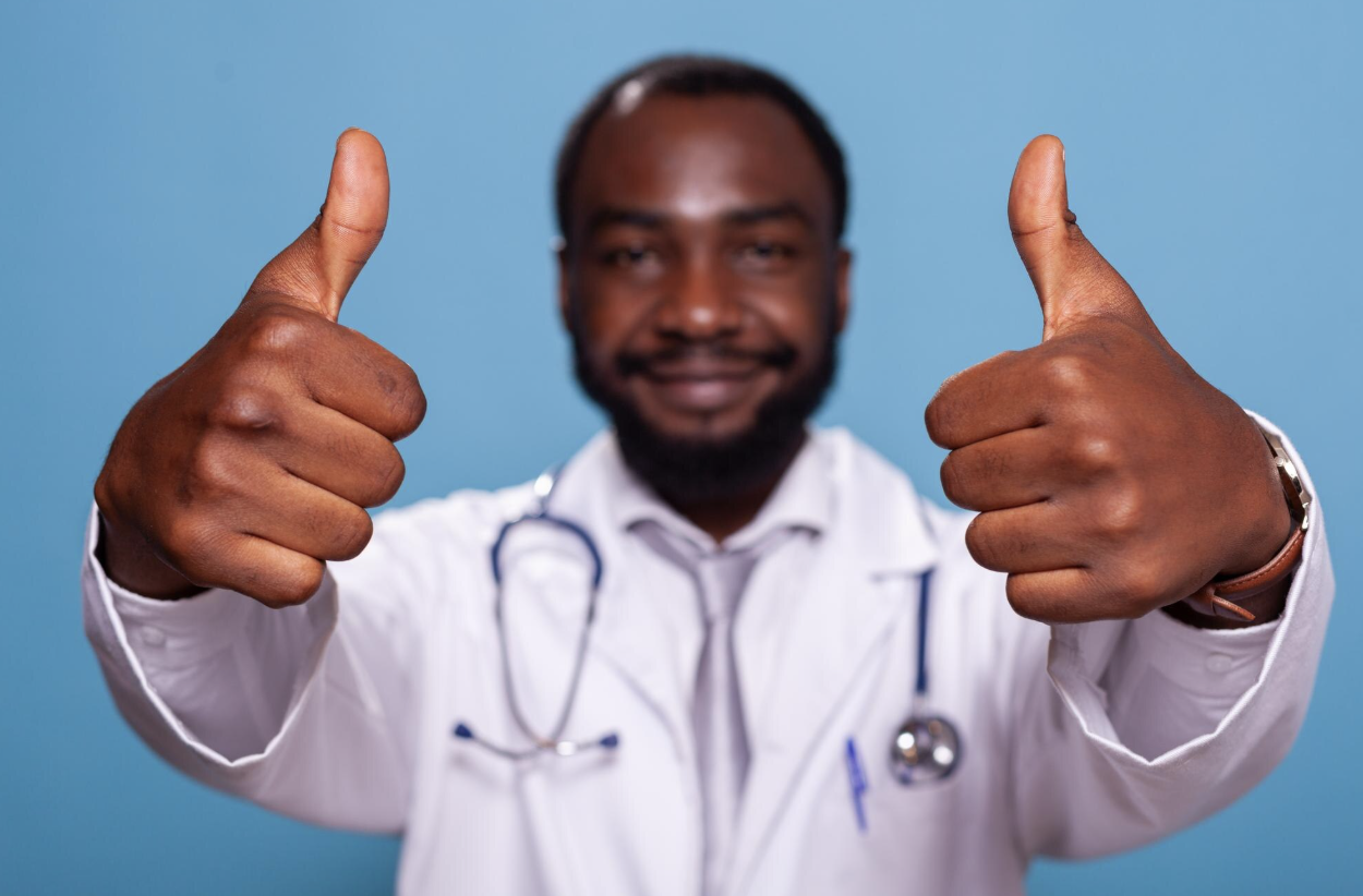 Doctor giving thumbs up