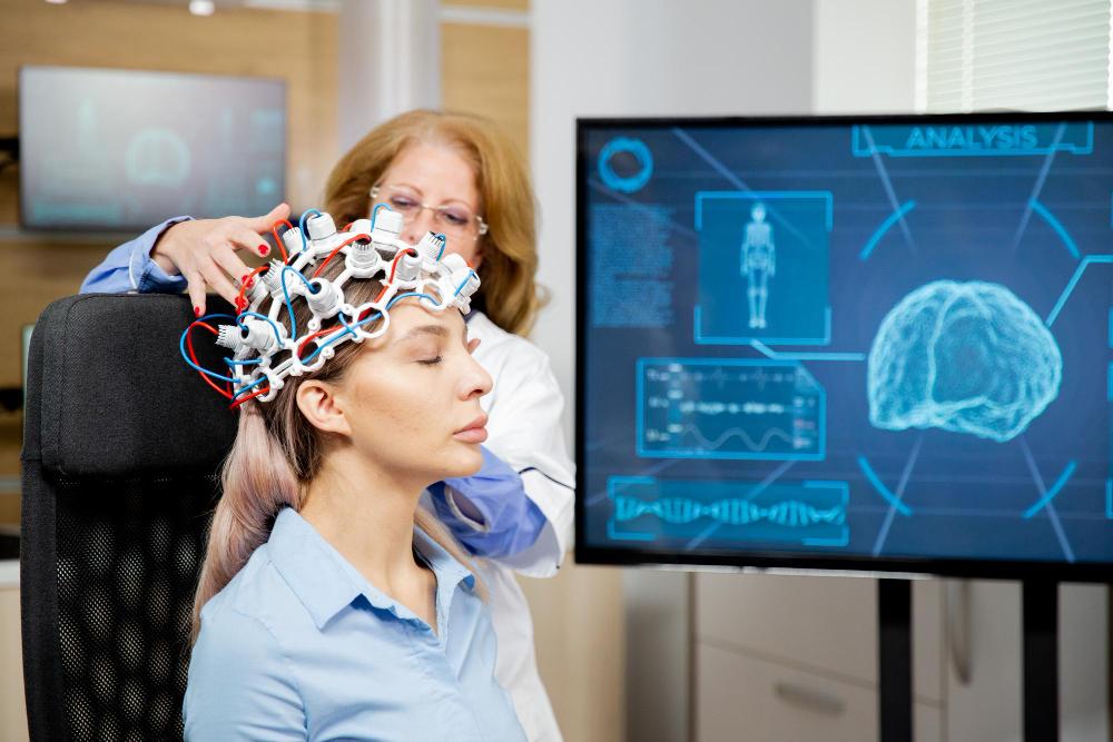 Clinician applying brain mapping-based neuroacupuncture stimulation